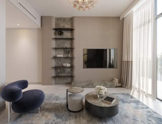 Modern living room with marble shelves, TV, and blue velvet chairs.