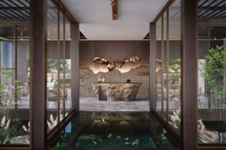 A modern cafe interior with a rock-inspired counter and hanging gold light fixtures.