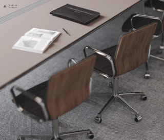 Close-up of modern conference room table with wooden chairs, open magazine, black leather folder, and pencil on desk.