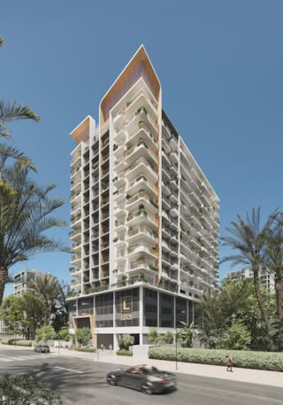 Modern residential building with balconies and greenery in Dubai.