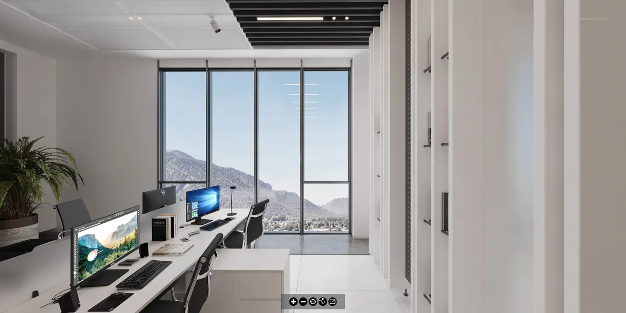 A second perspective on the office interior and its shared spaces.